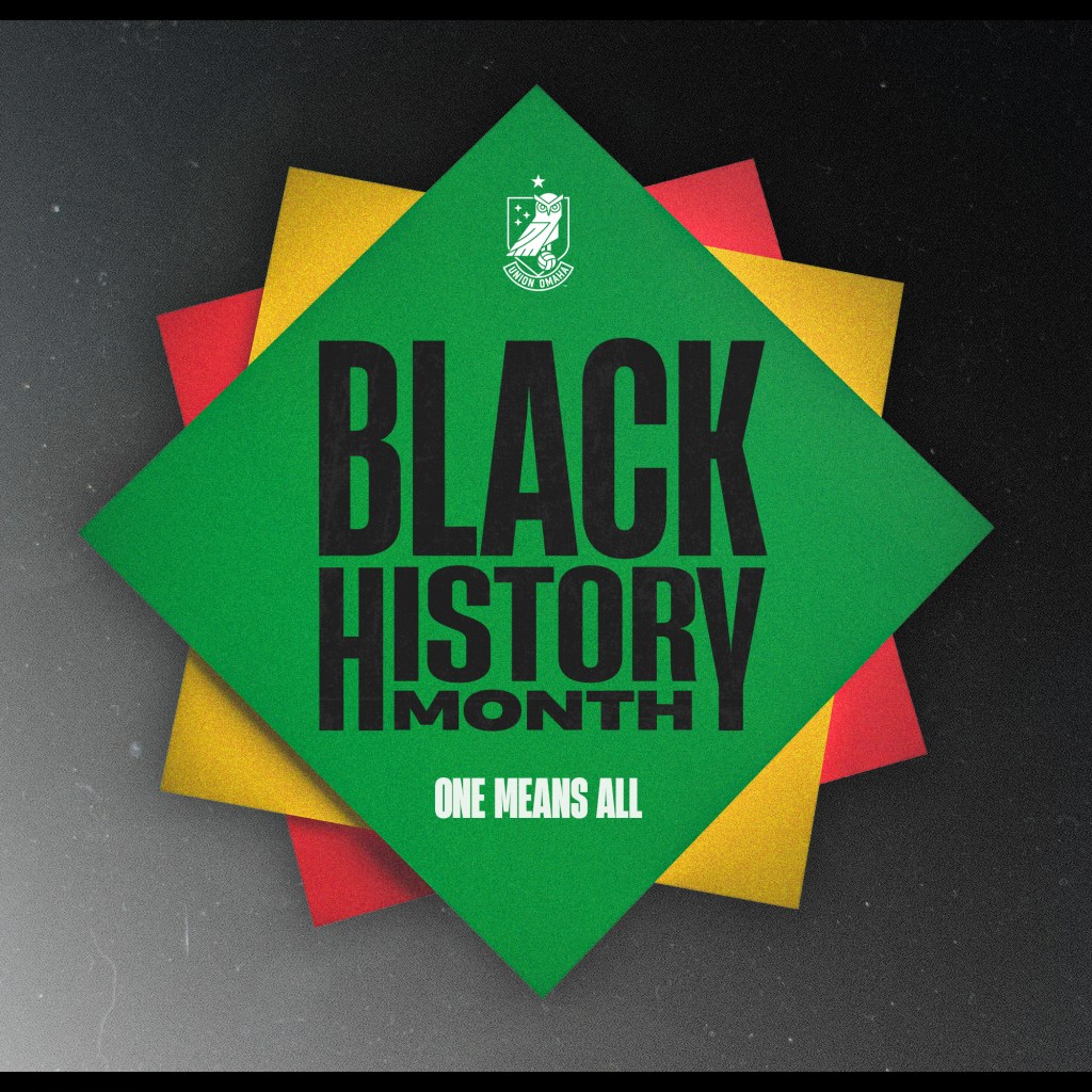 "Black History Month" text on top of green, yellow and red paper stacked into a design.