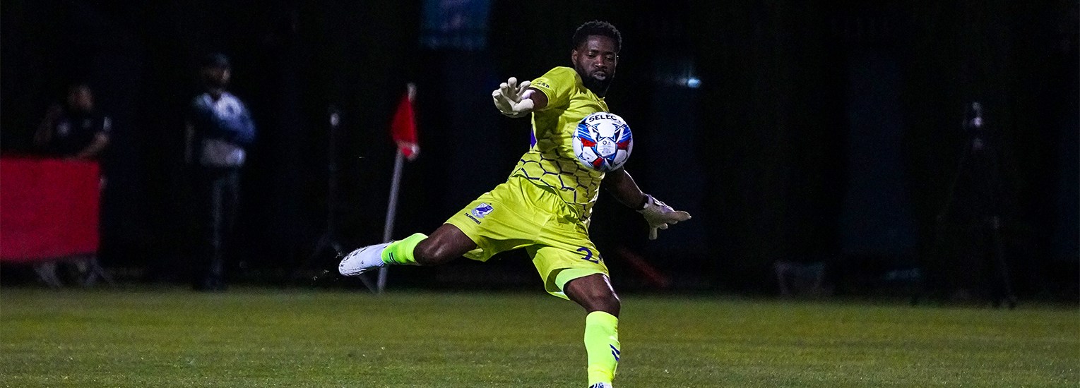 Rashid Nuhu boots the ball upfield against Pioneers