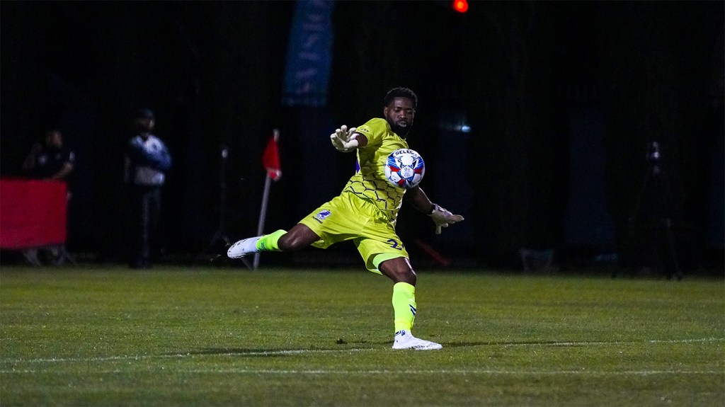 Rashid Nuhu boots the ball upfield against Pioneers