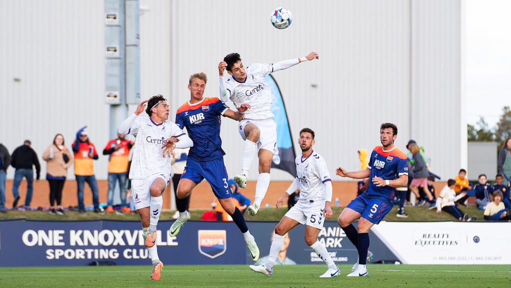 Union Omaha player going for a contested header vs. One Knox