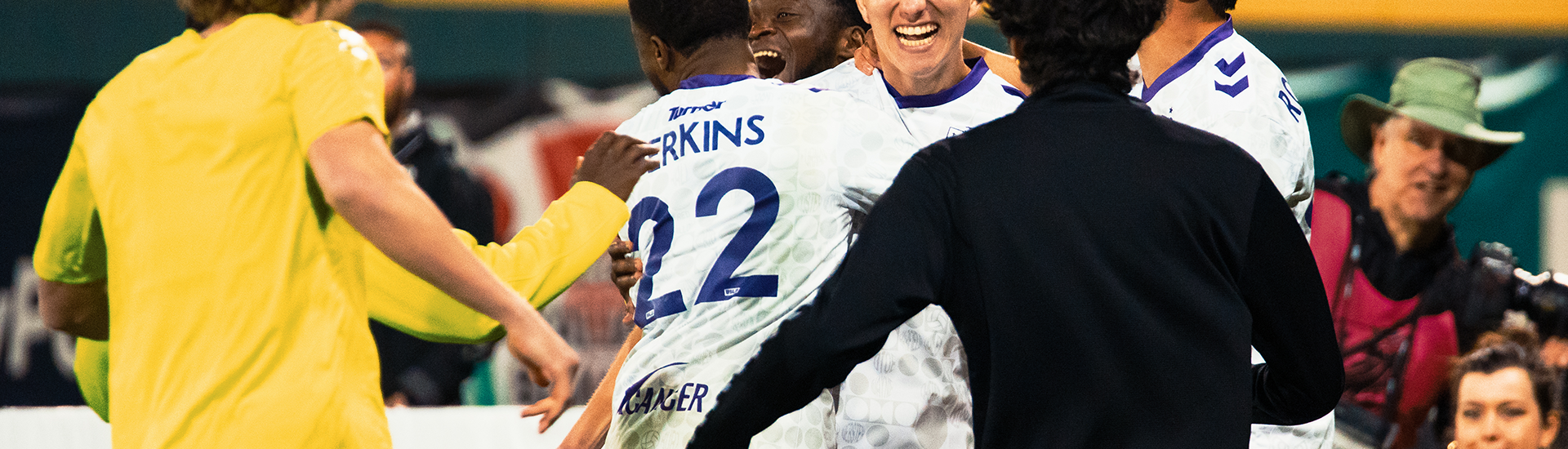 Union Omaha players celebrating after penalty kick win