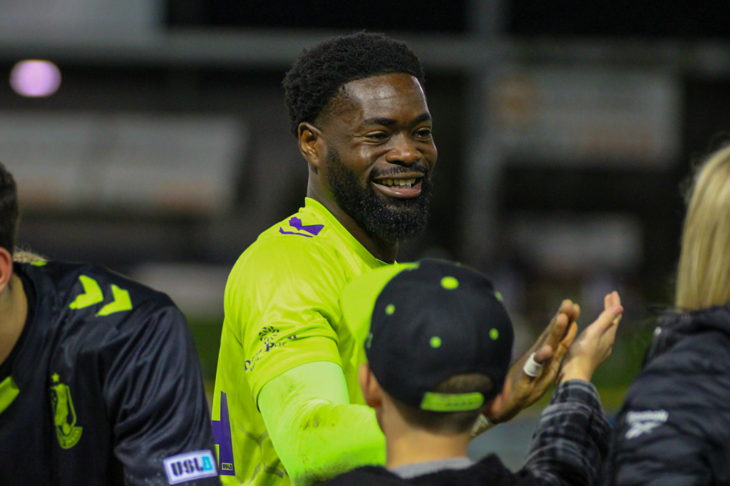 Rashid Nuhu high-fiving fans