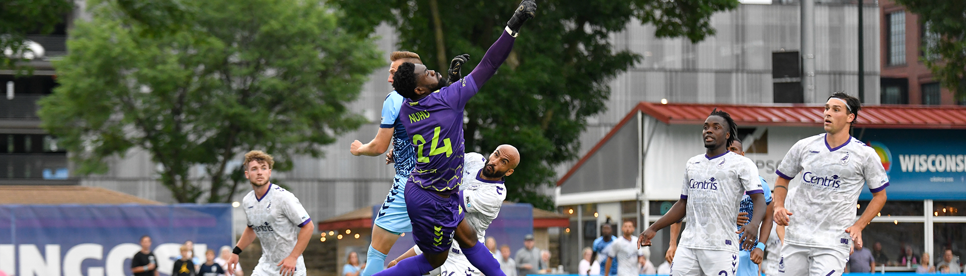Rashid Nuhu gong for the ball against Madison