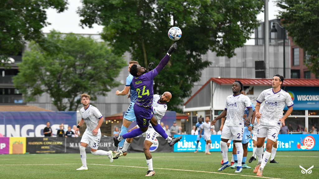 Rashid Nuhu gong for the ball against Madison