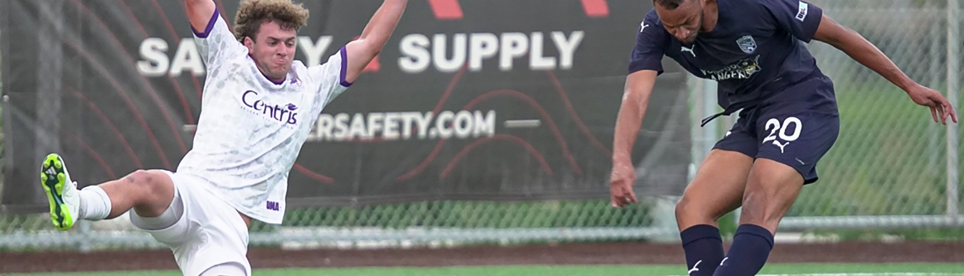 Blake Malone sliding to defend against Northern Colorado