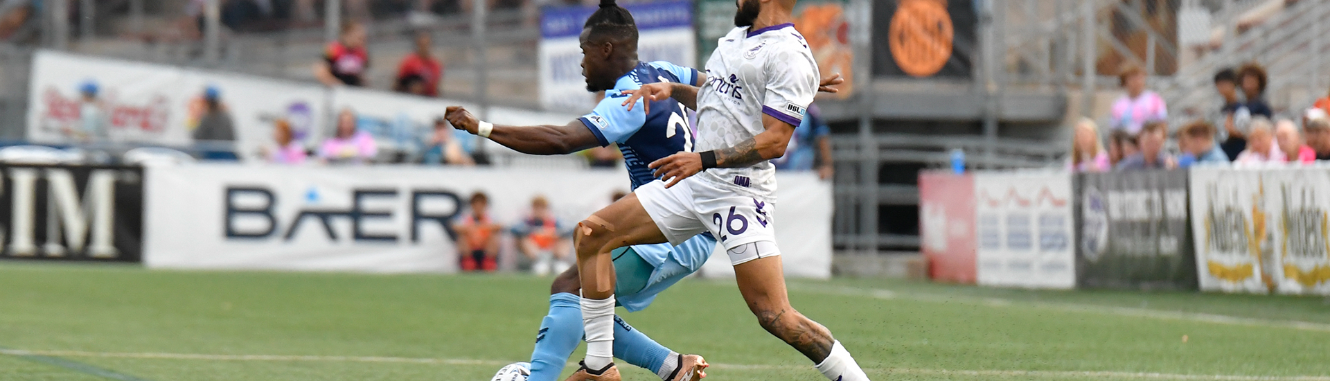 Dion Acoff defending versus Forward Madison