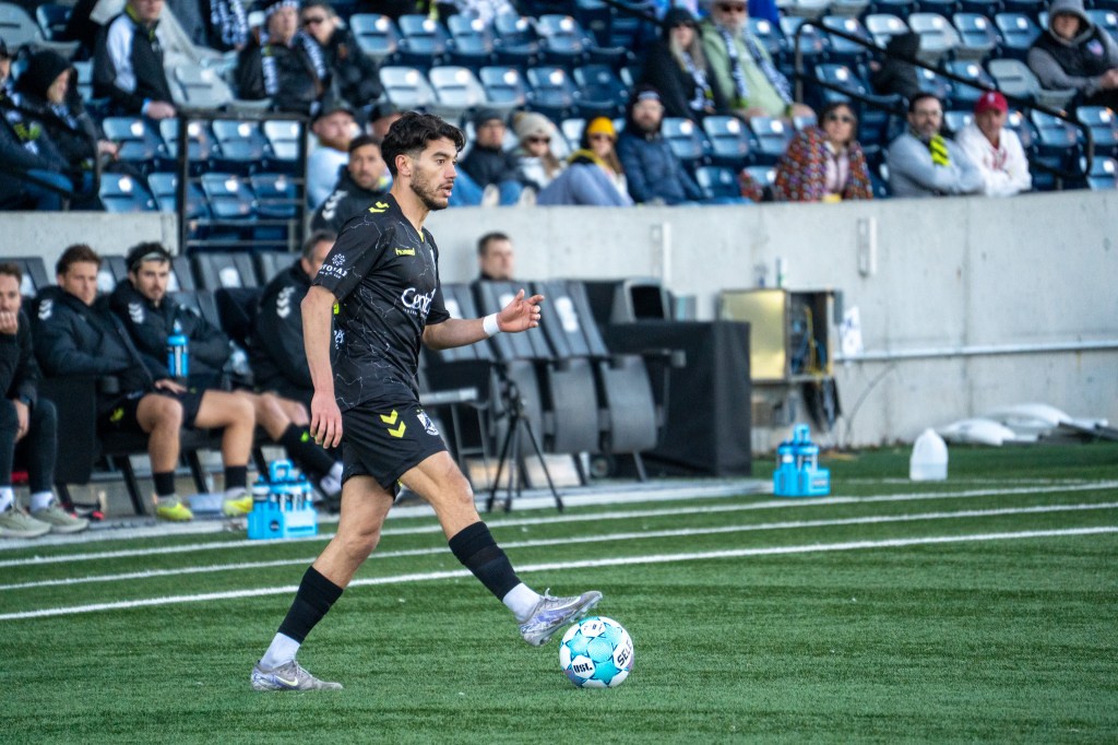 Younes Boudadi on the ball against AV Alta FC