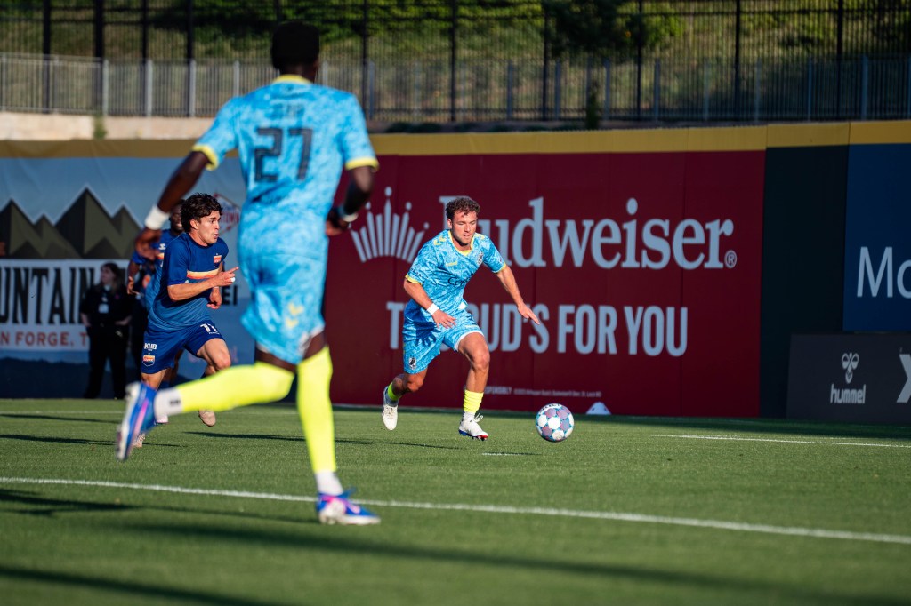 Blake Malone with the ball at his feet against One Knoxville SC